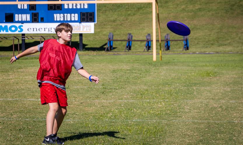 Students play ultimate frisbee